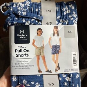 NWT still in package Blue Floral and tan Girls Shorts - 2 Pack.